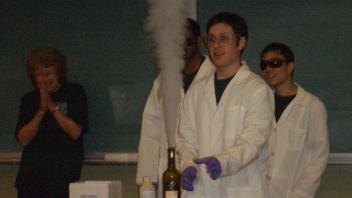 Marilyn with students at a 2008 Picnic Day chemistry show