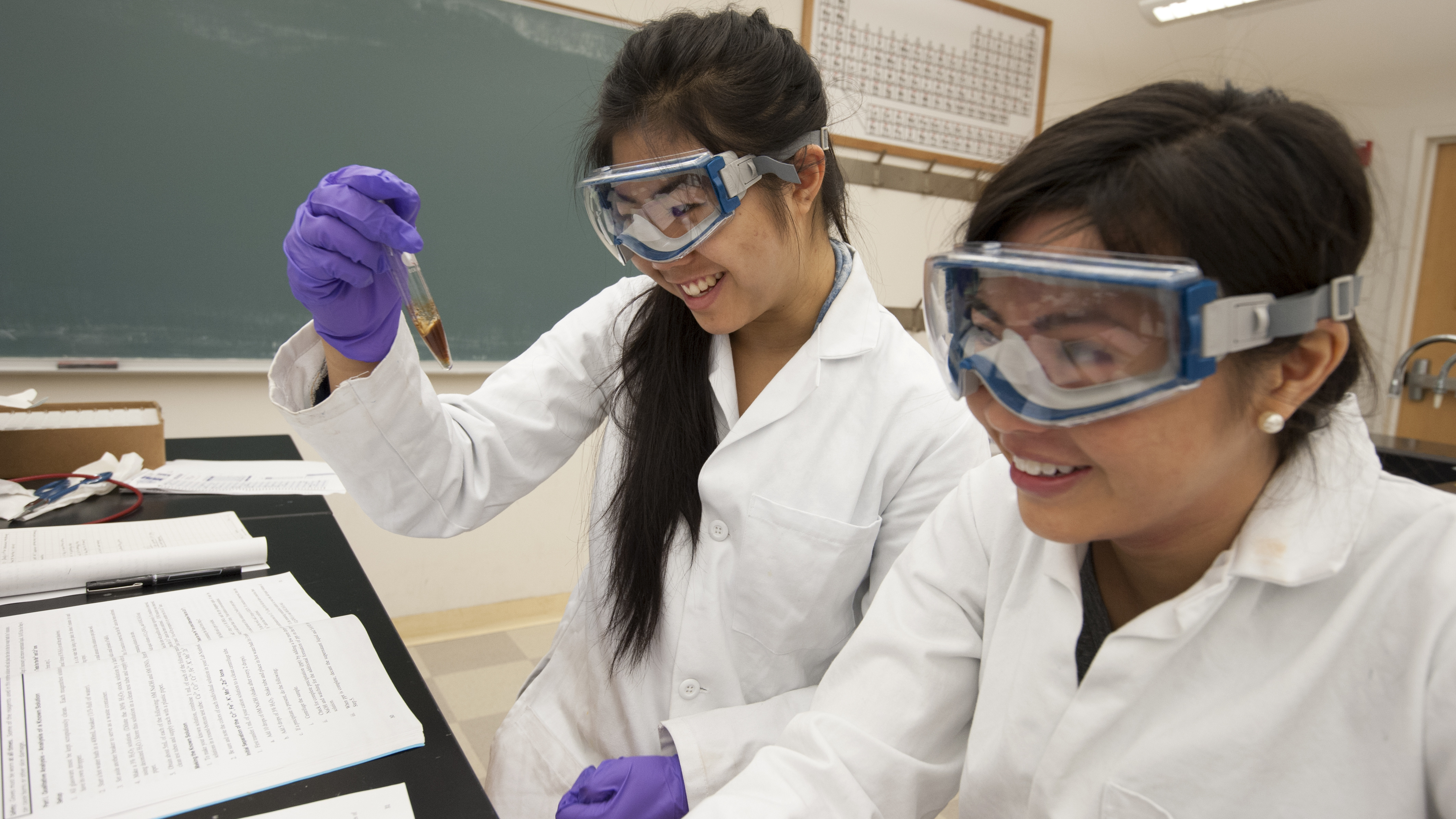 Jessica Bee and Angie Tran, biological science majors at UC Davis, conduct their experiment during a Chemistry 2C lab at UC Davis on Tuesday, April 29, 2014.  The students were preforming qualitative analysis on a solution, trying to identify the five cations present.