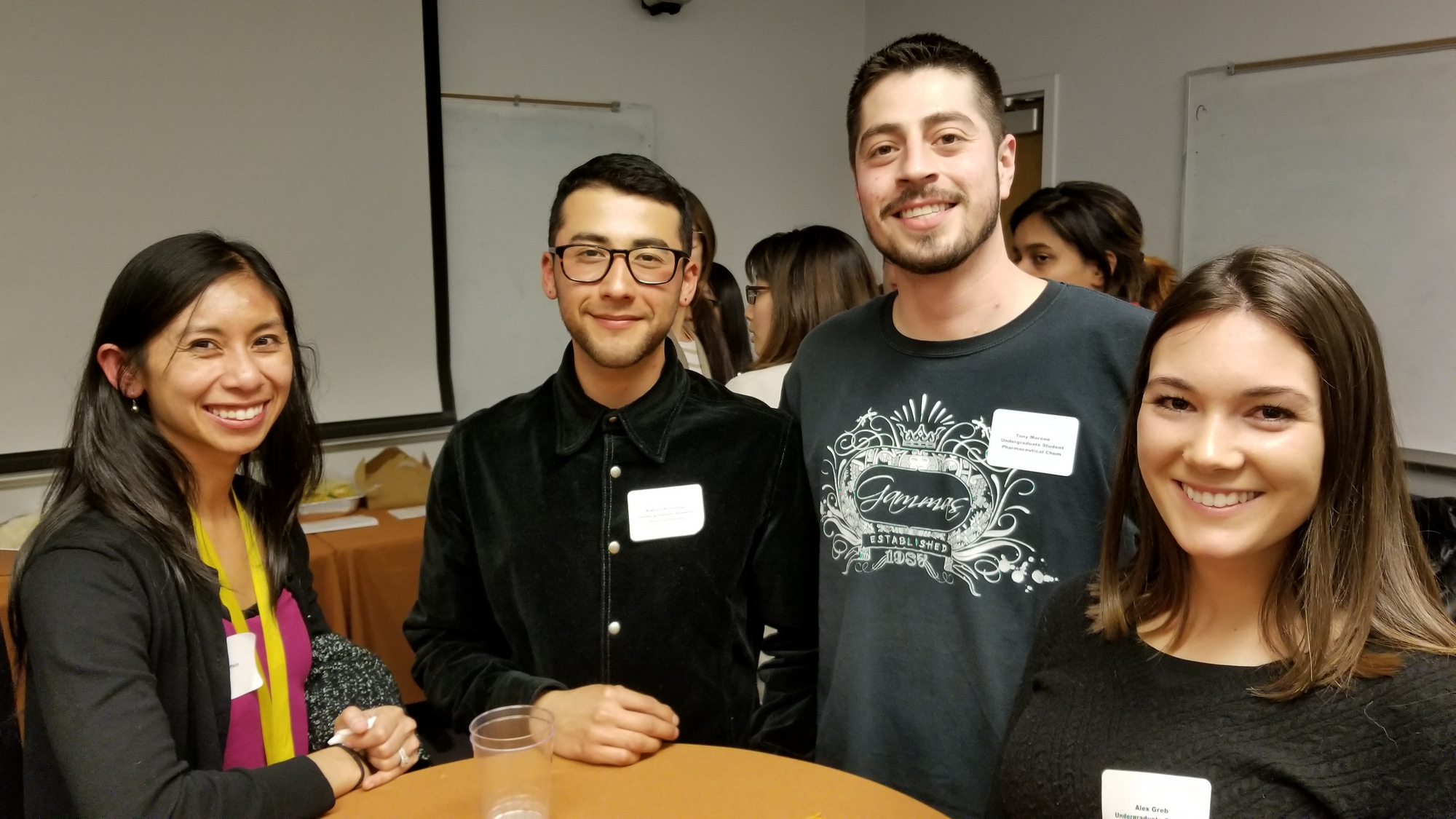 Professor Marie Heffern with undergraduate students Aubrey, Tony and Alex.