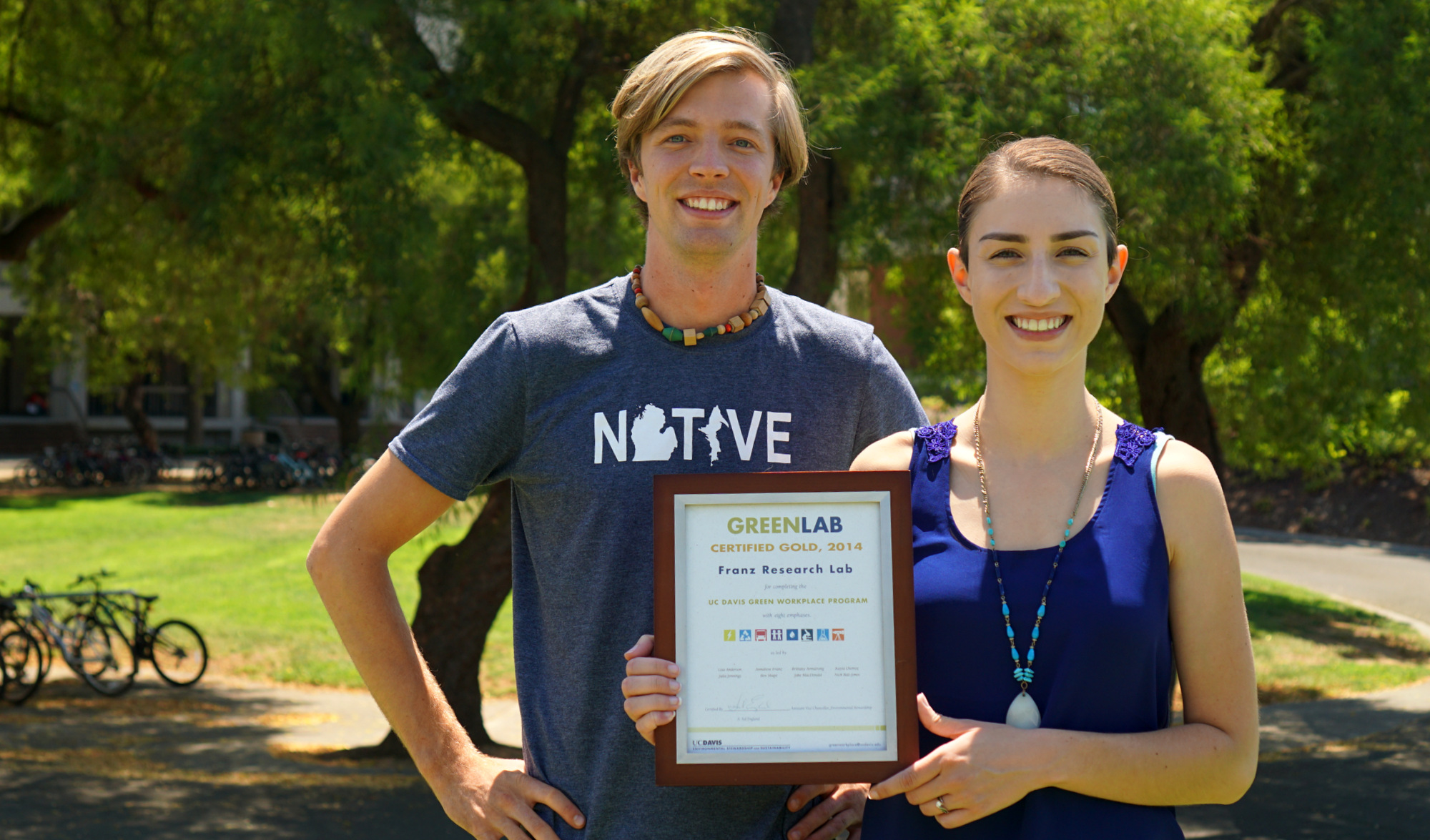Graduate students Cody Yothers and Brittany Armstrong of the Franz Research Group show off their Green Lab certification. Graduate students and "Green Champions" Cody Yothers and Brittany Armstrong of the Franz Research Group show off their Green Lab certification.