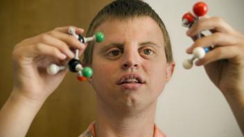 Henry Hoby Wedler, a graduate student in chemistry at UC Davis, demonstrates his molecule builder set, which depicts the structure of ethyl acetate broken into parts. It helps him form a mental image of the chemical bonds. Wedler wishes to go on to teach. Photo taken on September 11, 2011.